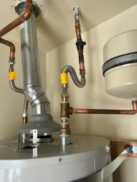 Water heater installation and plumbing repair in Merrick
